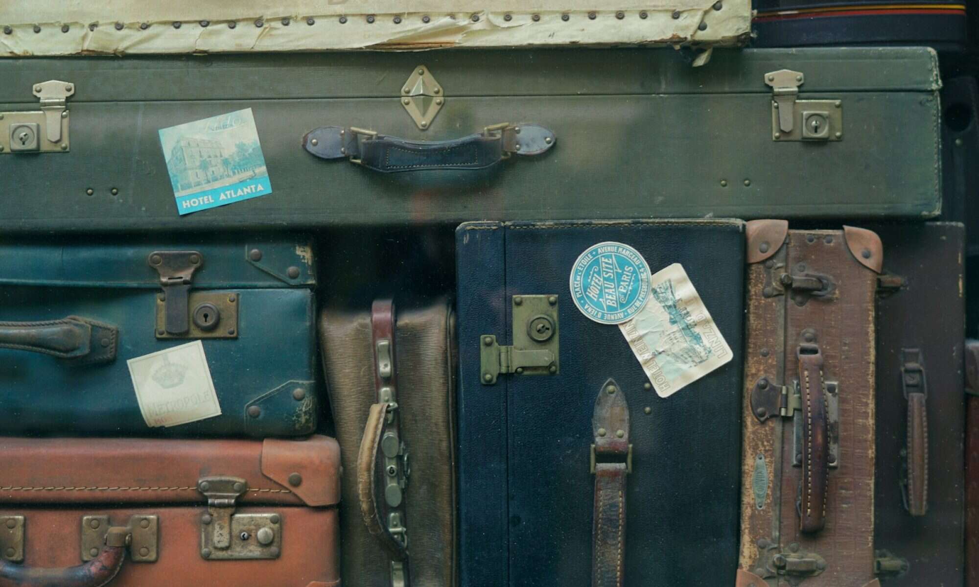 stack of assorted-color suit case lot